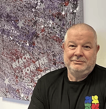 A man with surfboard