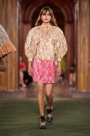 Image may contain Snejana Onopka Fashion Adult Person Blouse Clothing Dress Skirt Footwear Shoe and Formal Wear