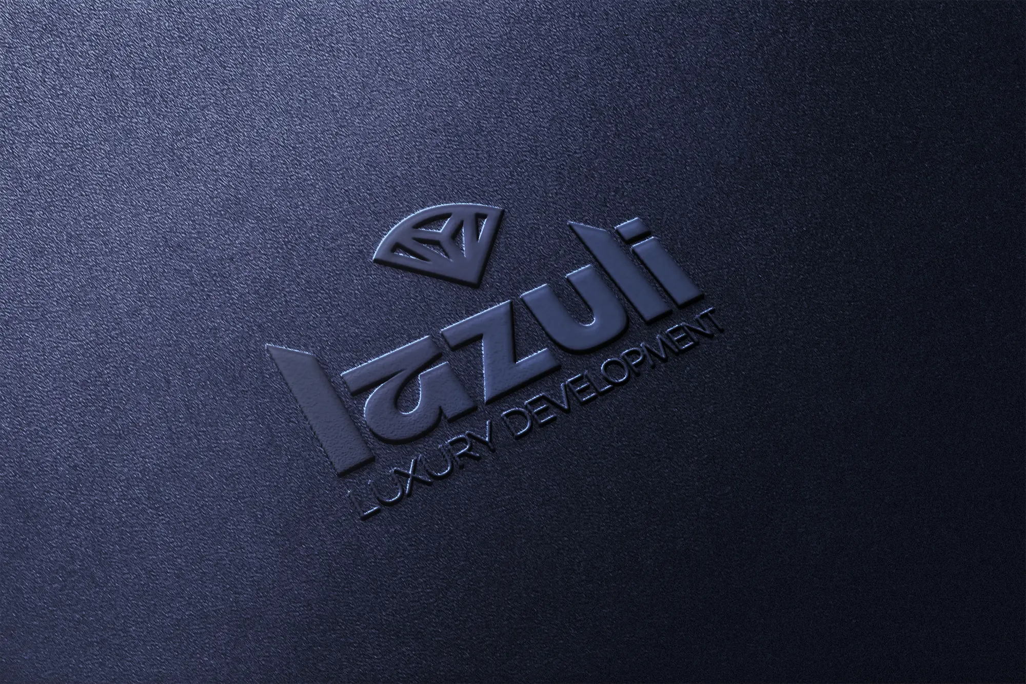 Embossed Lazuli Luxury Development logo on navy card