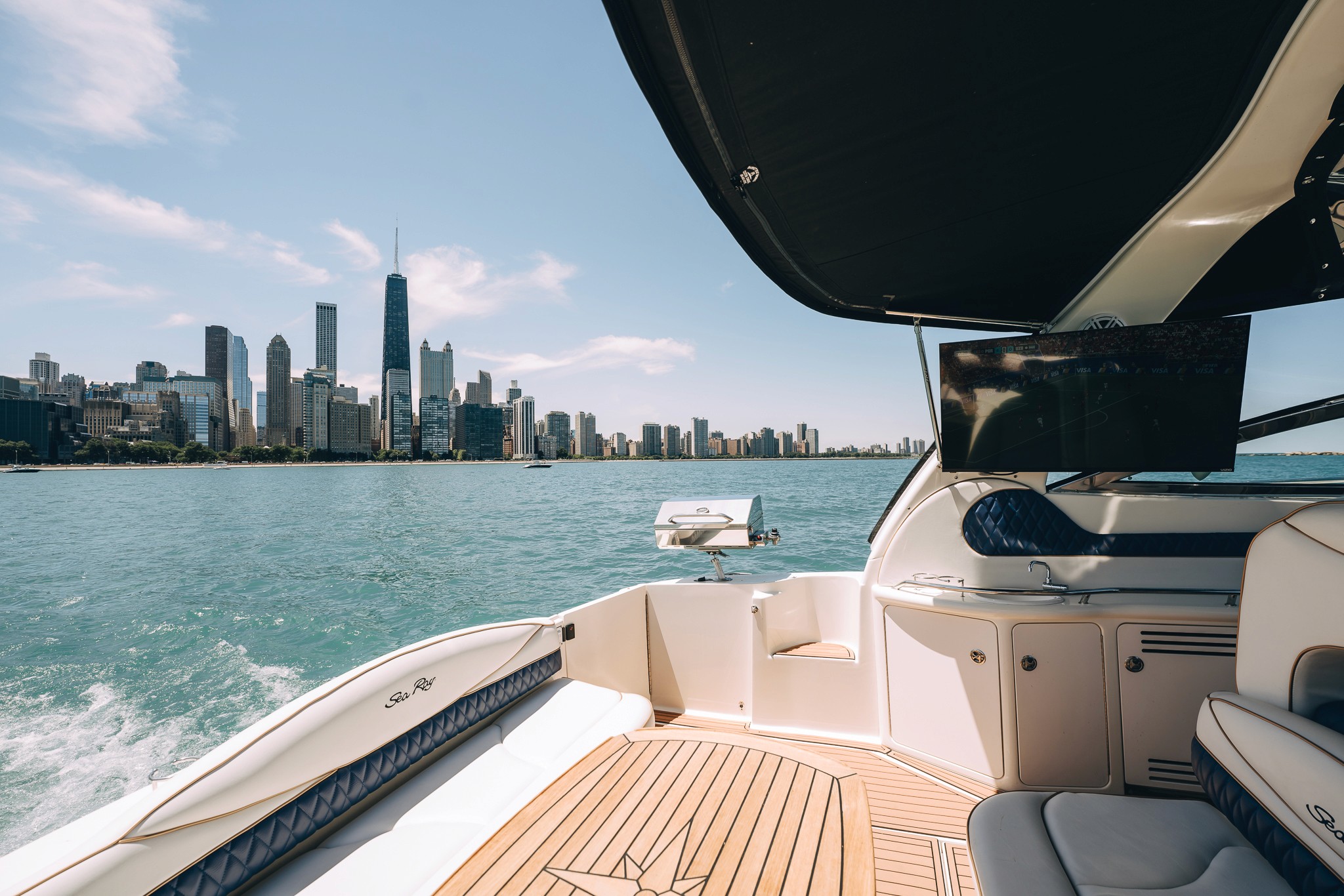 Yacht cockpit framing the Chicago skyline
