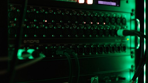 a close up of a computer with green lights