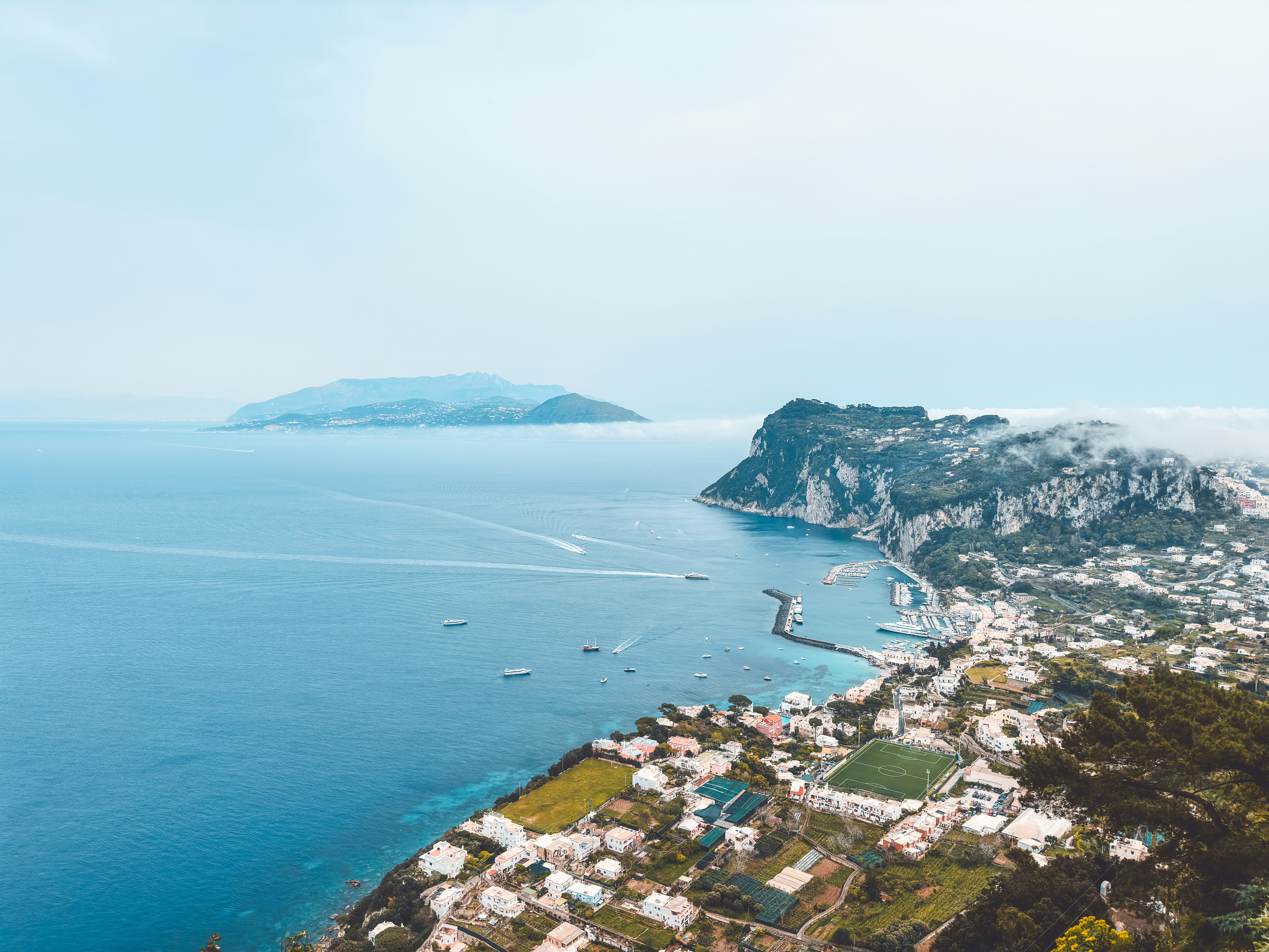 An aerial view of a town and the ocean Amalfi Coast
