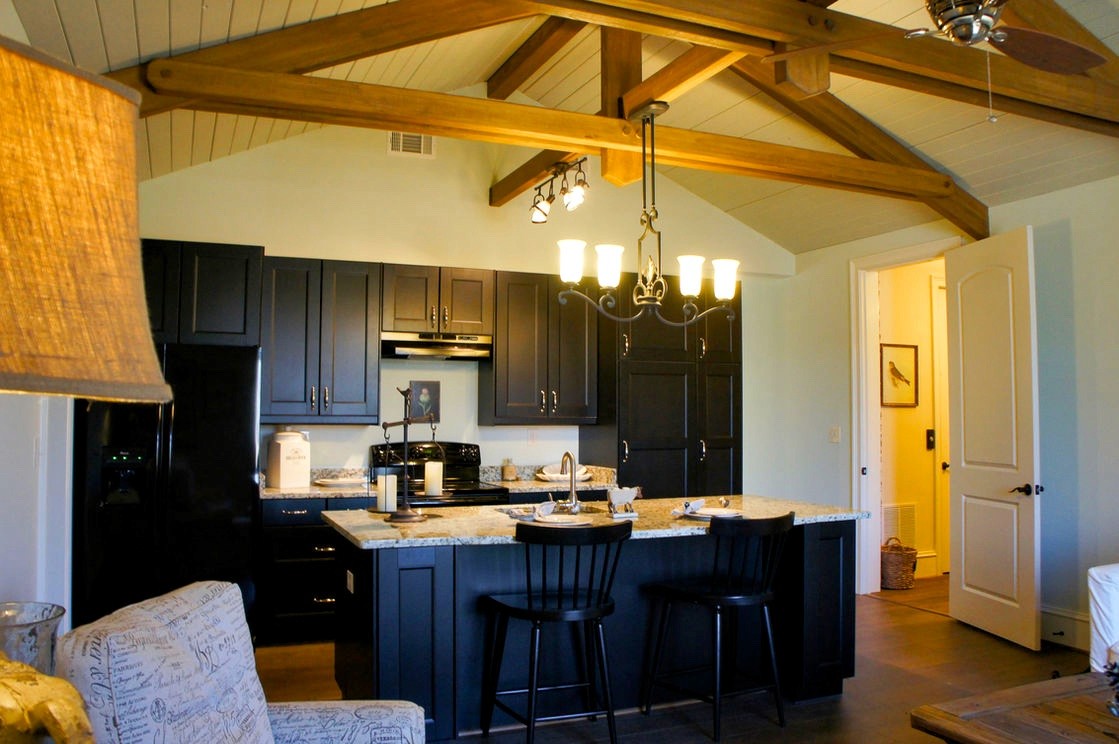 Spacious kitchen with island in Manor House in the Meadow, Jasper GA