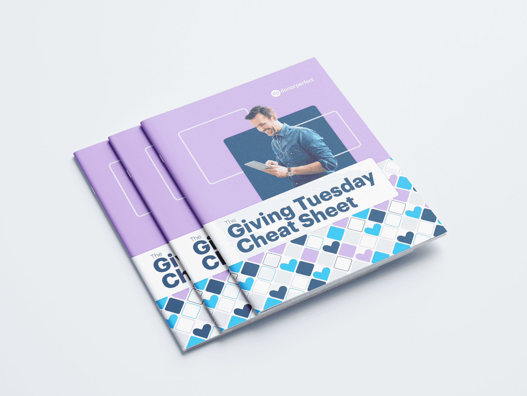 A stack of Giving Tuesday Cheat Sheet booklets.