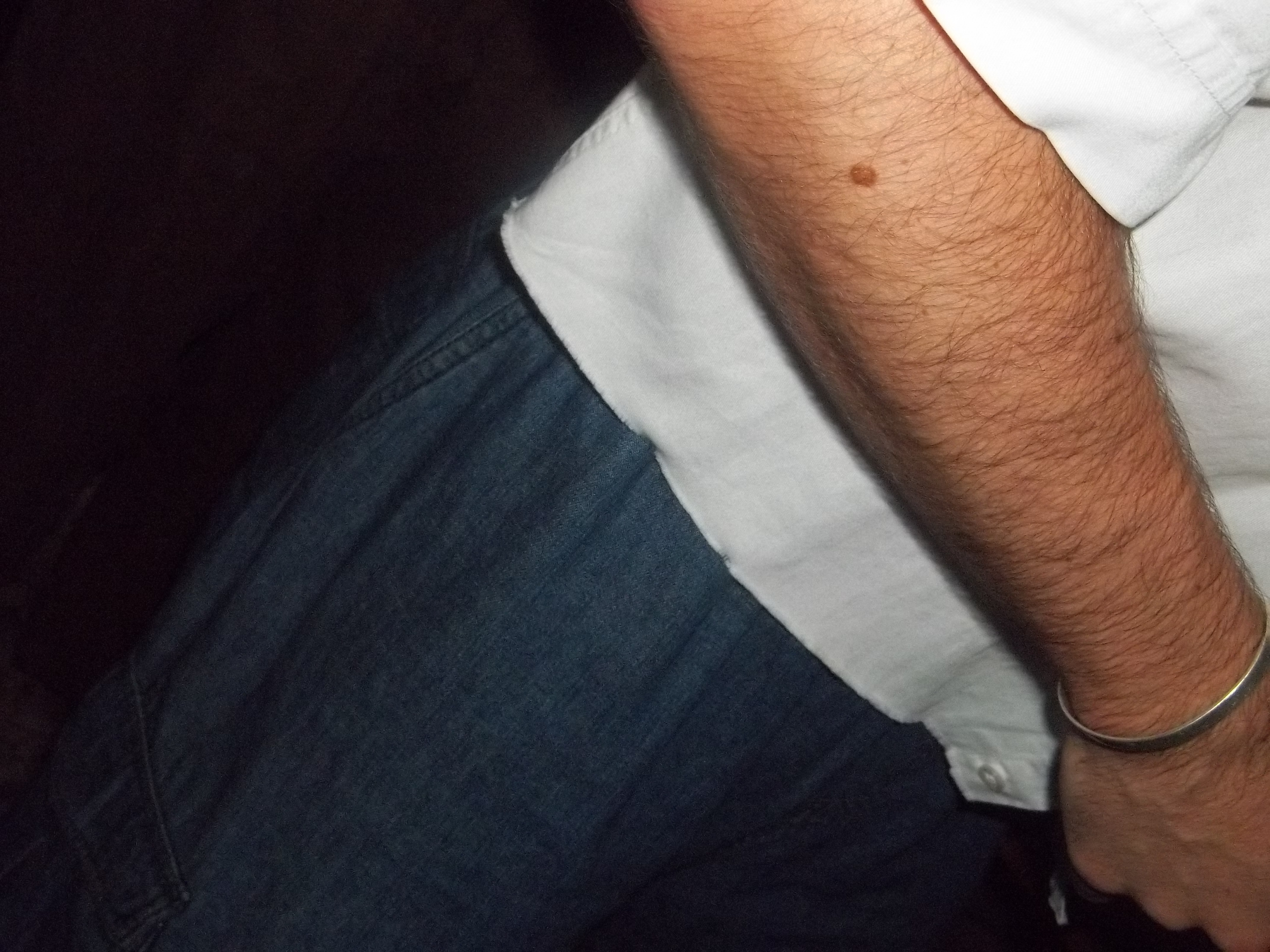 A group of people sitting around a living room