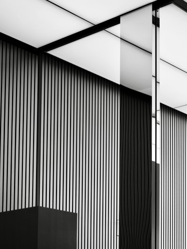 Modern interior with textured walls and lighting