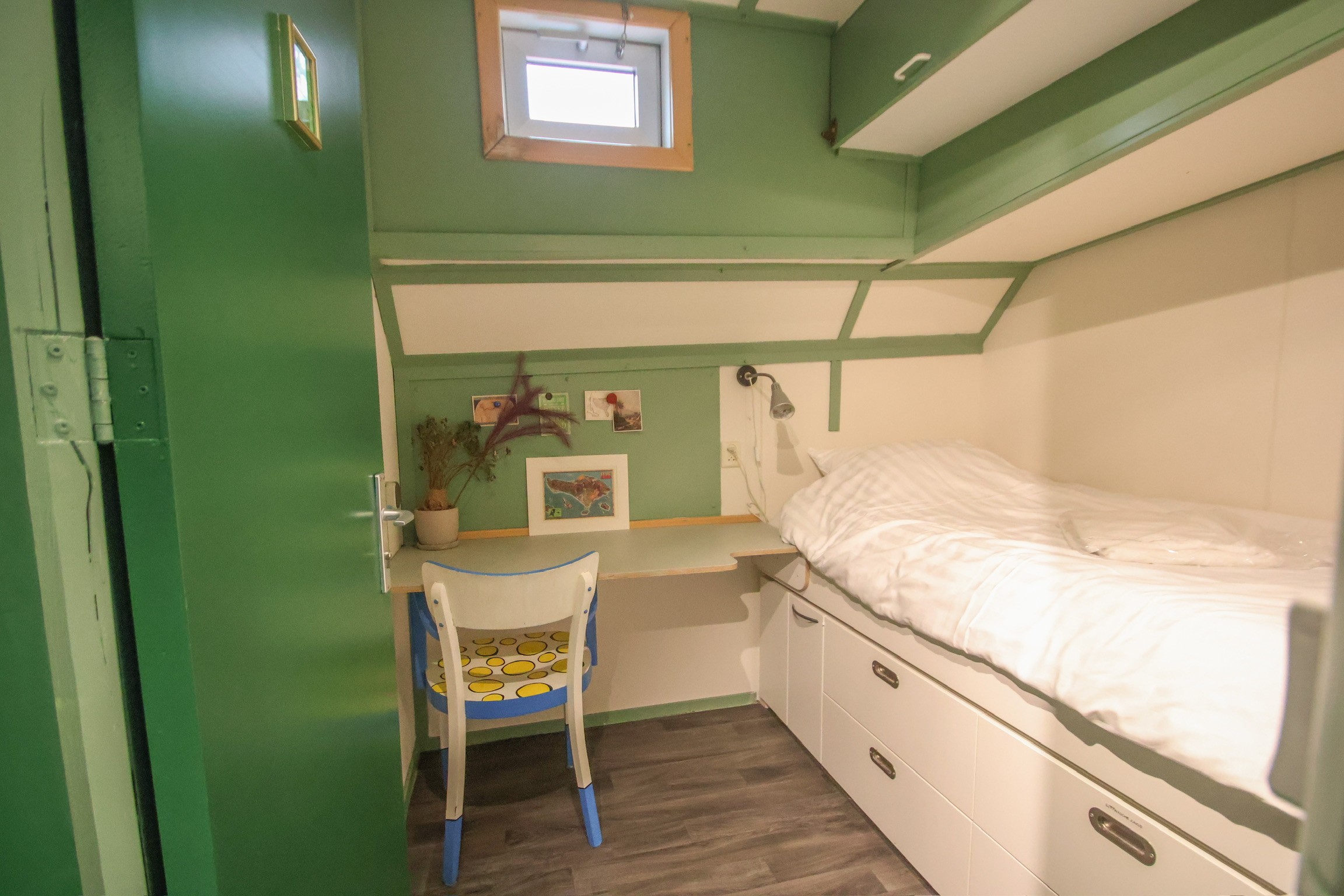 Classic bedroom with canopy bed and patterned pillows