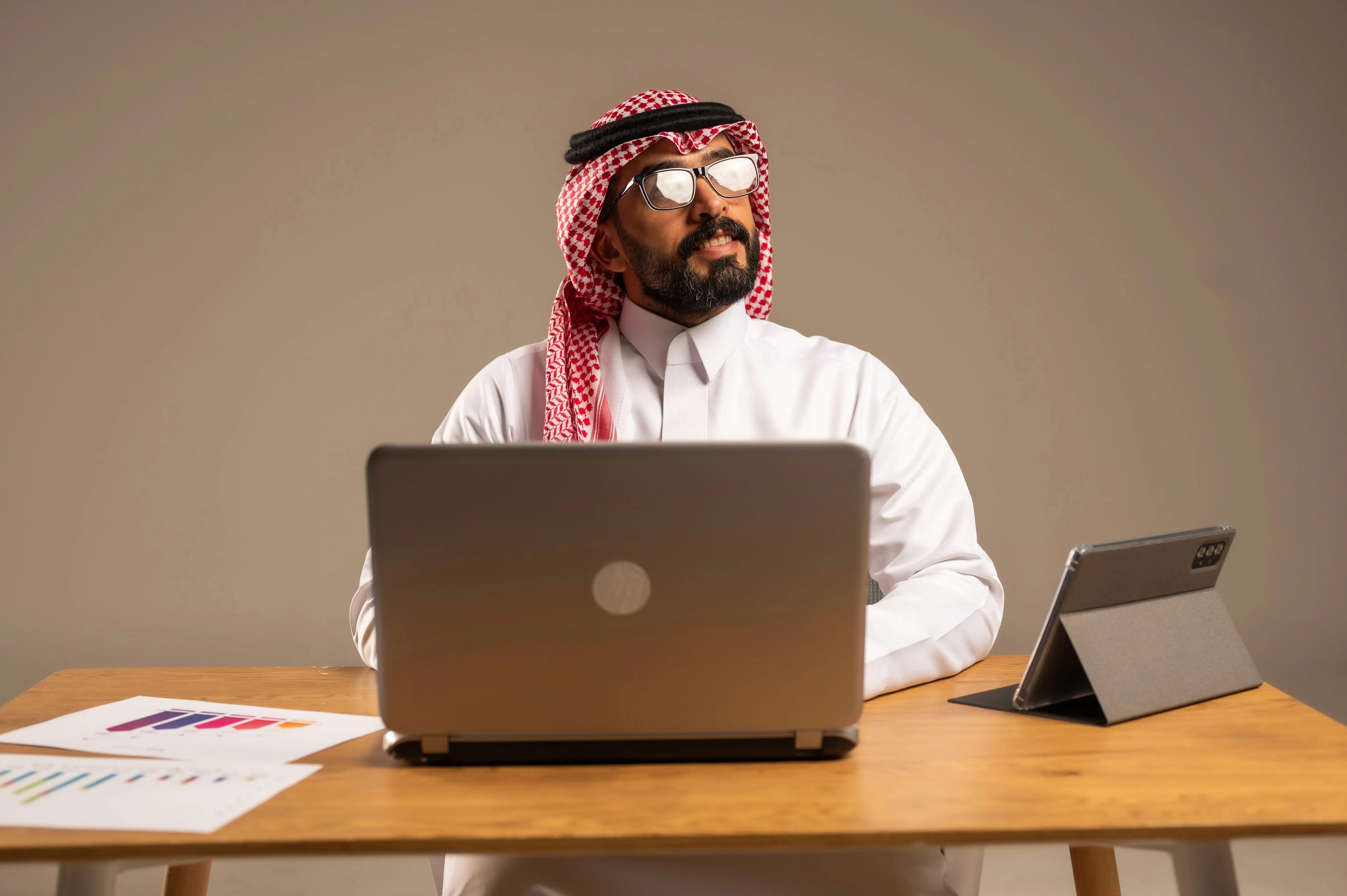 Man sitting infront of laptop