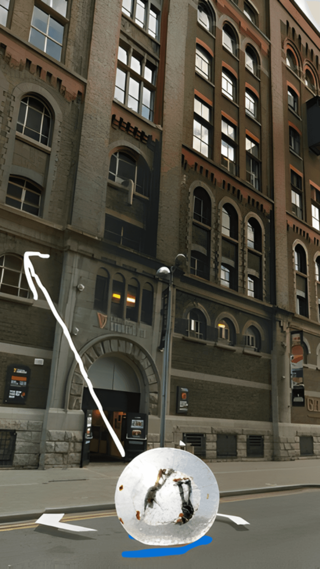 The bubble makes contact with the pavement, starting to transition into a liquid form