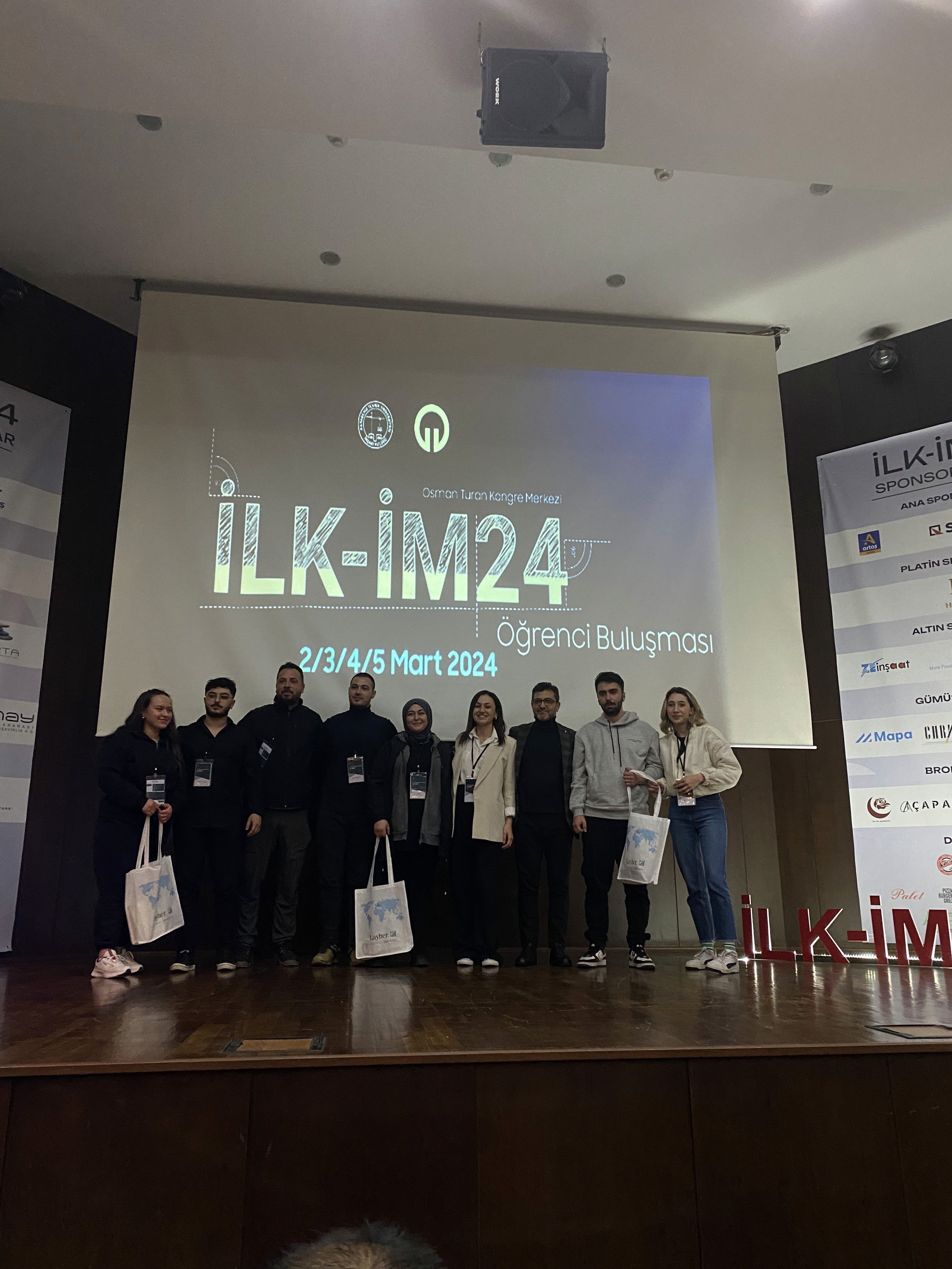 Young Men Looking at the Laptop Screen and Smiling