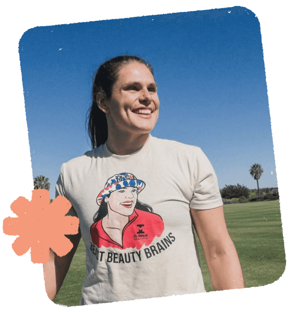 A woman smiling wearing a t-shirt