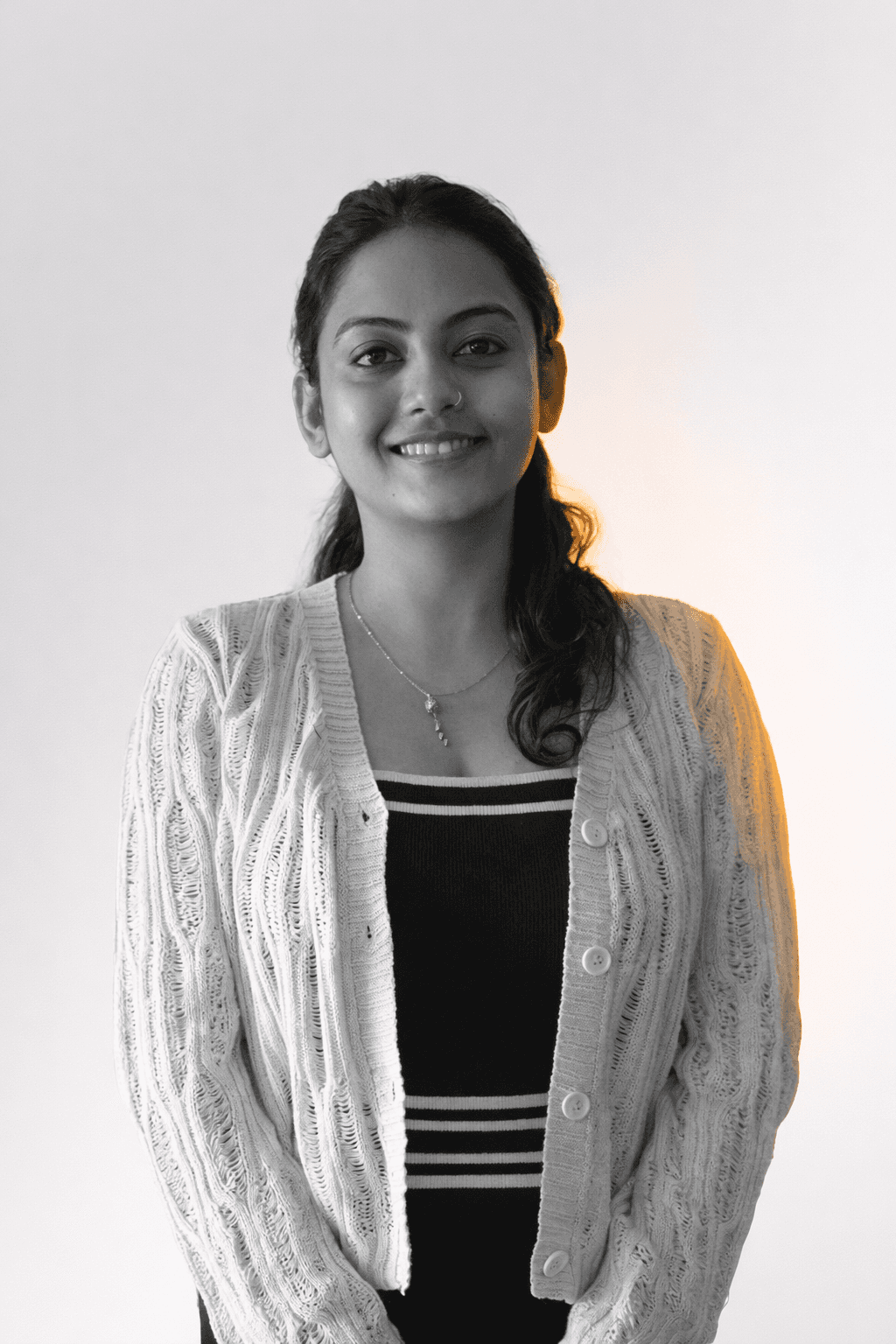man wearing eyeglasses and blue shirt inside coffee shop