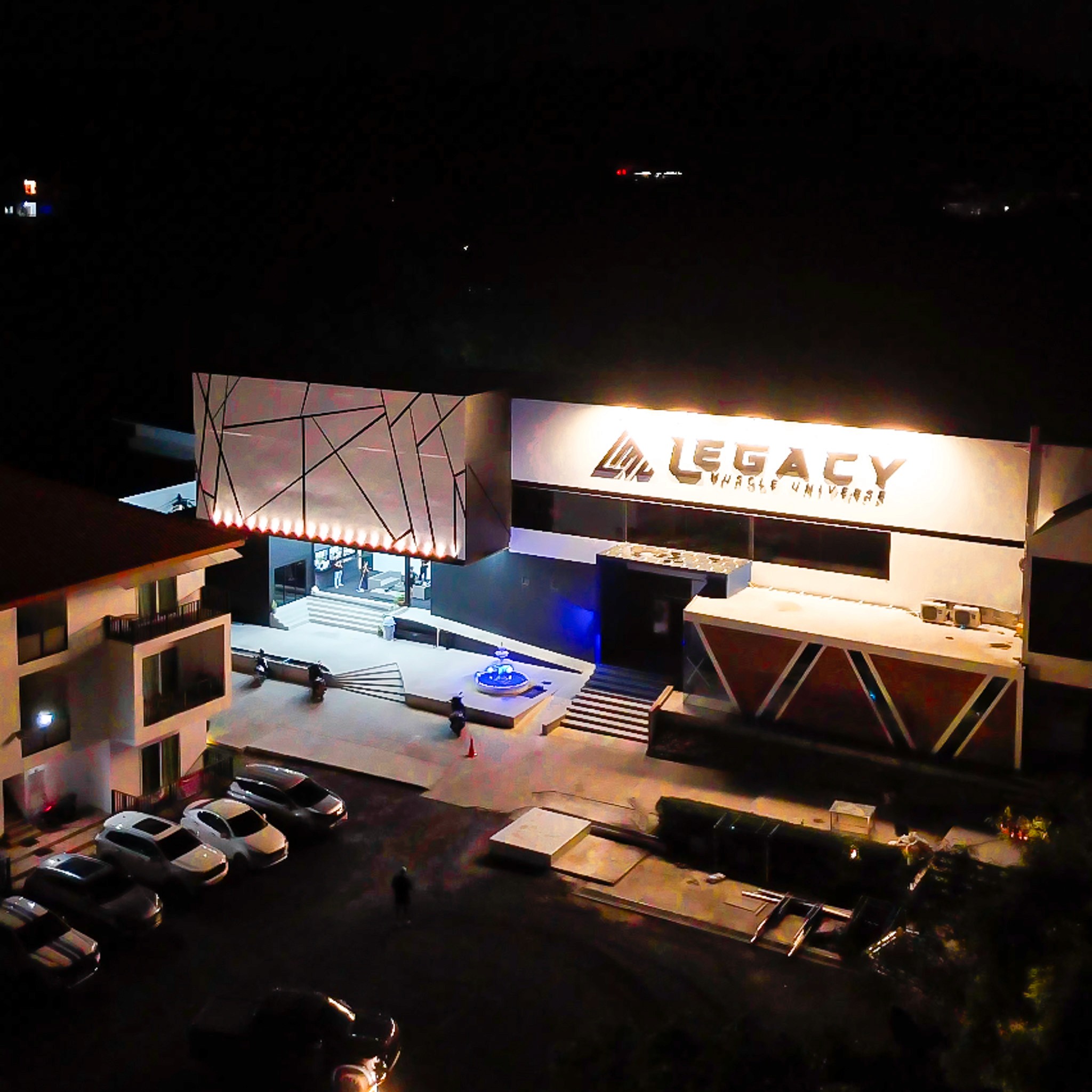 Exterior of Legacy Muscle Universe Koh Samui gym, a modern fitness center with sleek architecture in a tropical island setting.