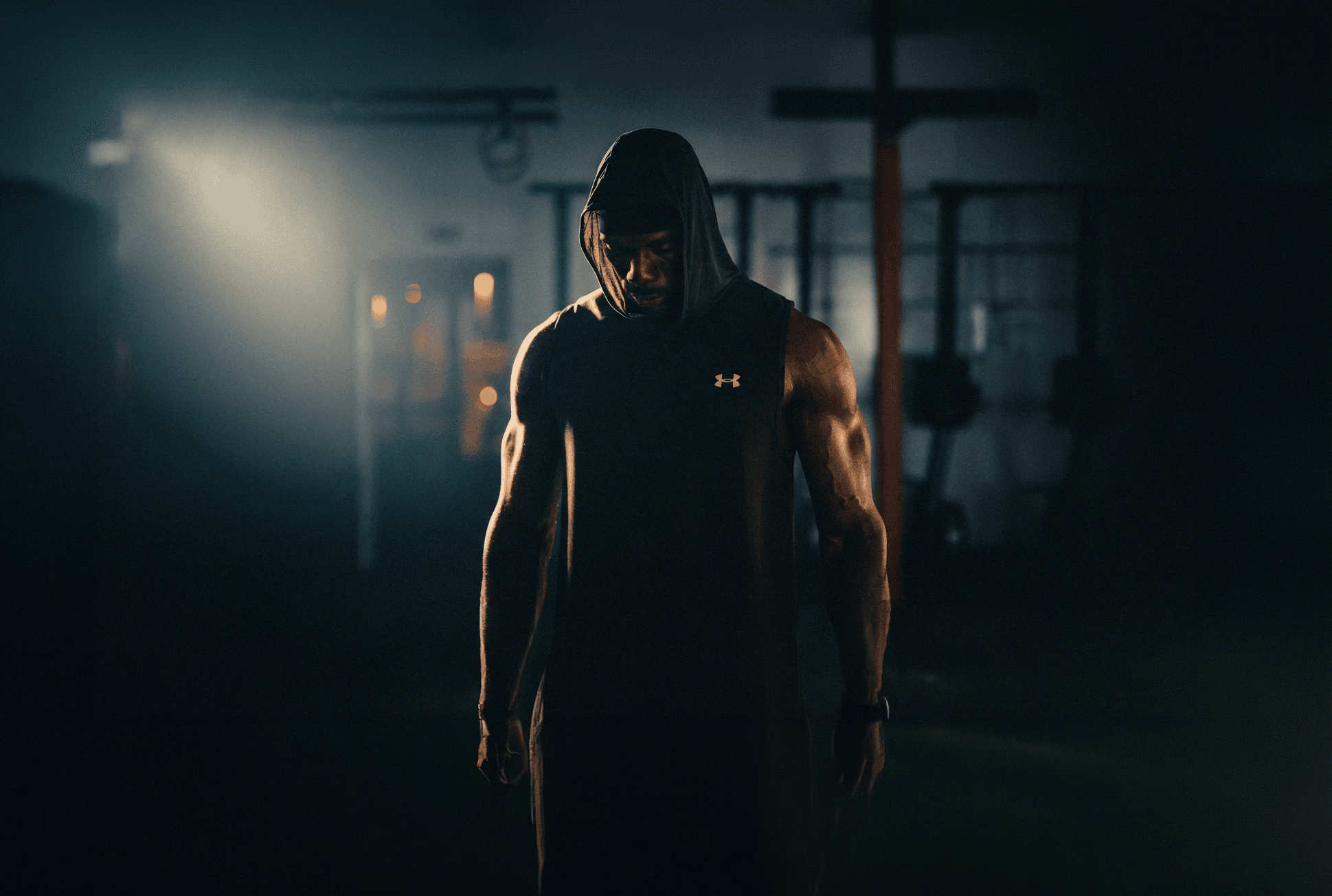 man in black tank top wearing black headphones