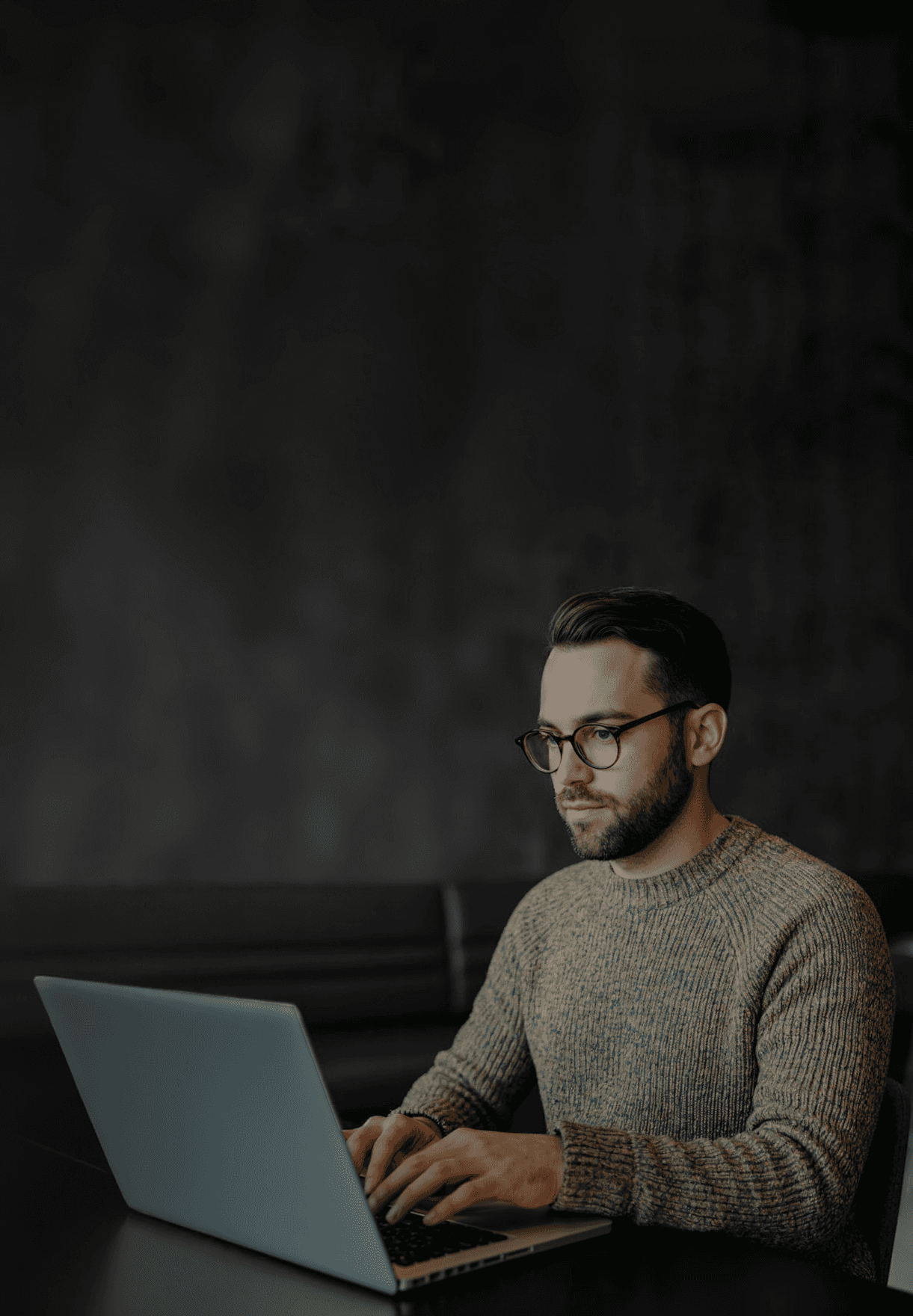 A man working at the desk