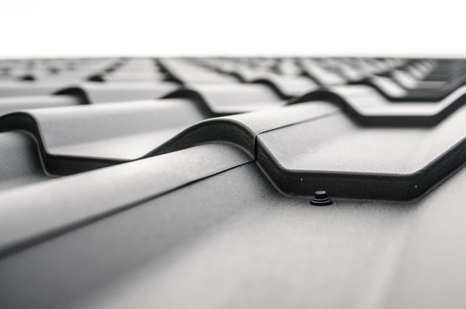 Close view of roof materials and flashing