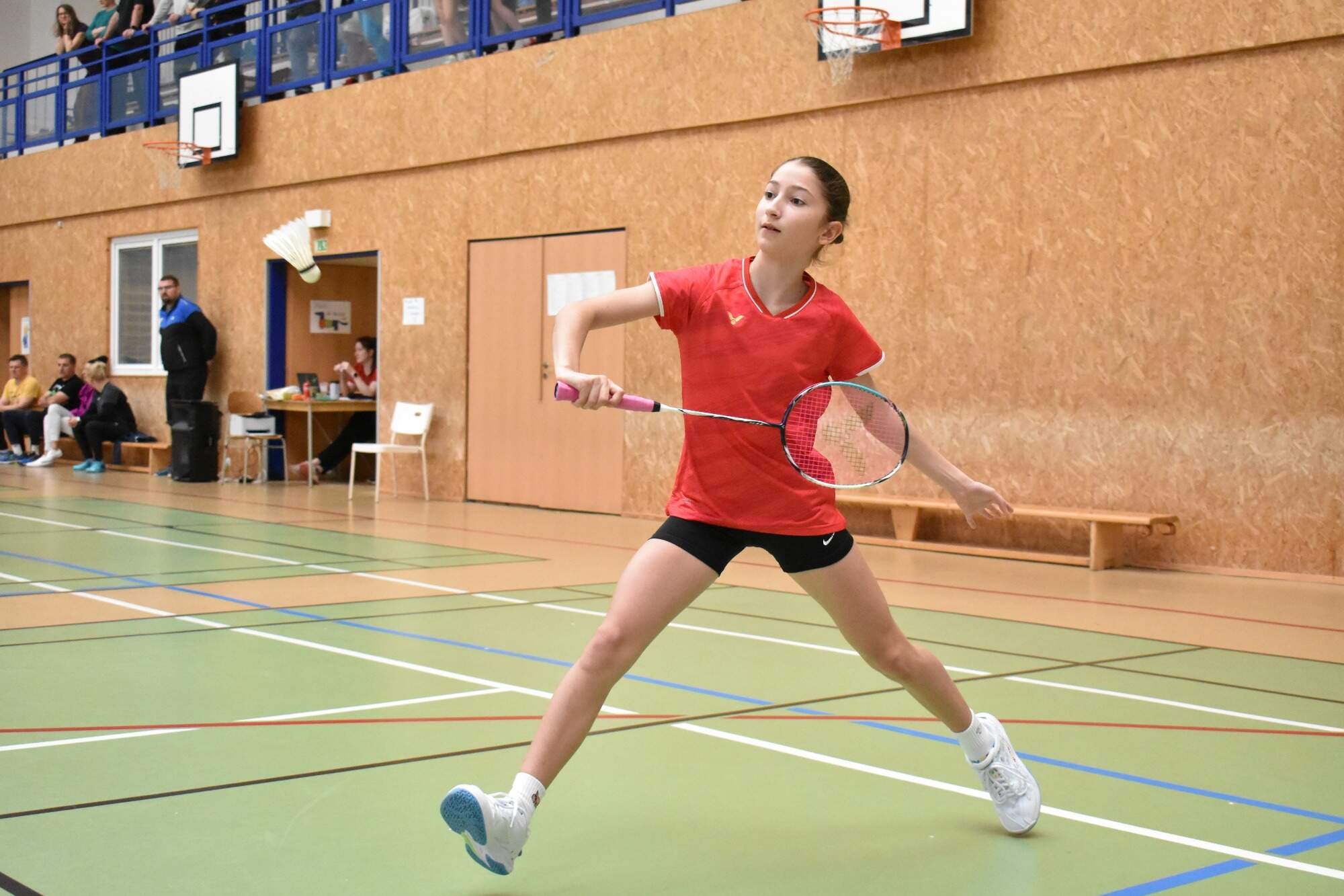 a person holding a small bowl of food