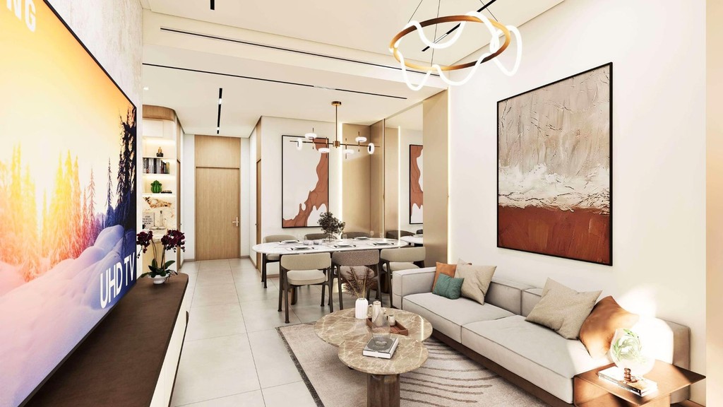 Contemporary living room with a dining area, including a table and chairs, reflecting the aesthetic of Xenia Residences