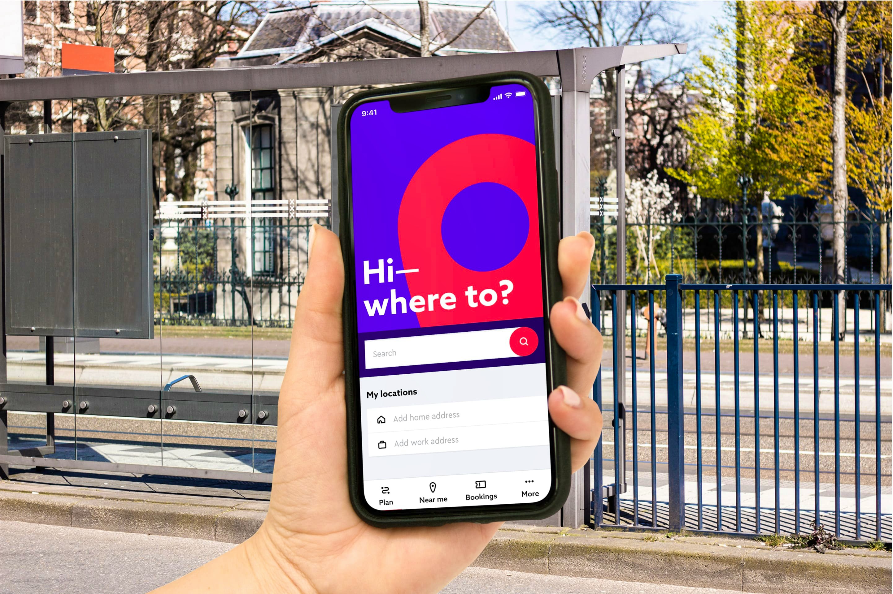 Amaze — hand holding a smartphone at a bus stop showing the Amaze multimodal travel planning app — Soda Studio case study