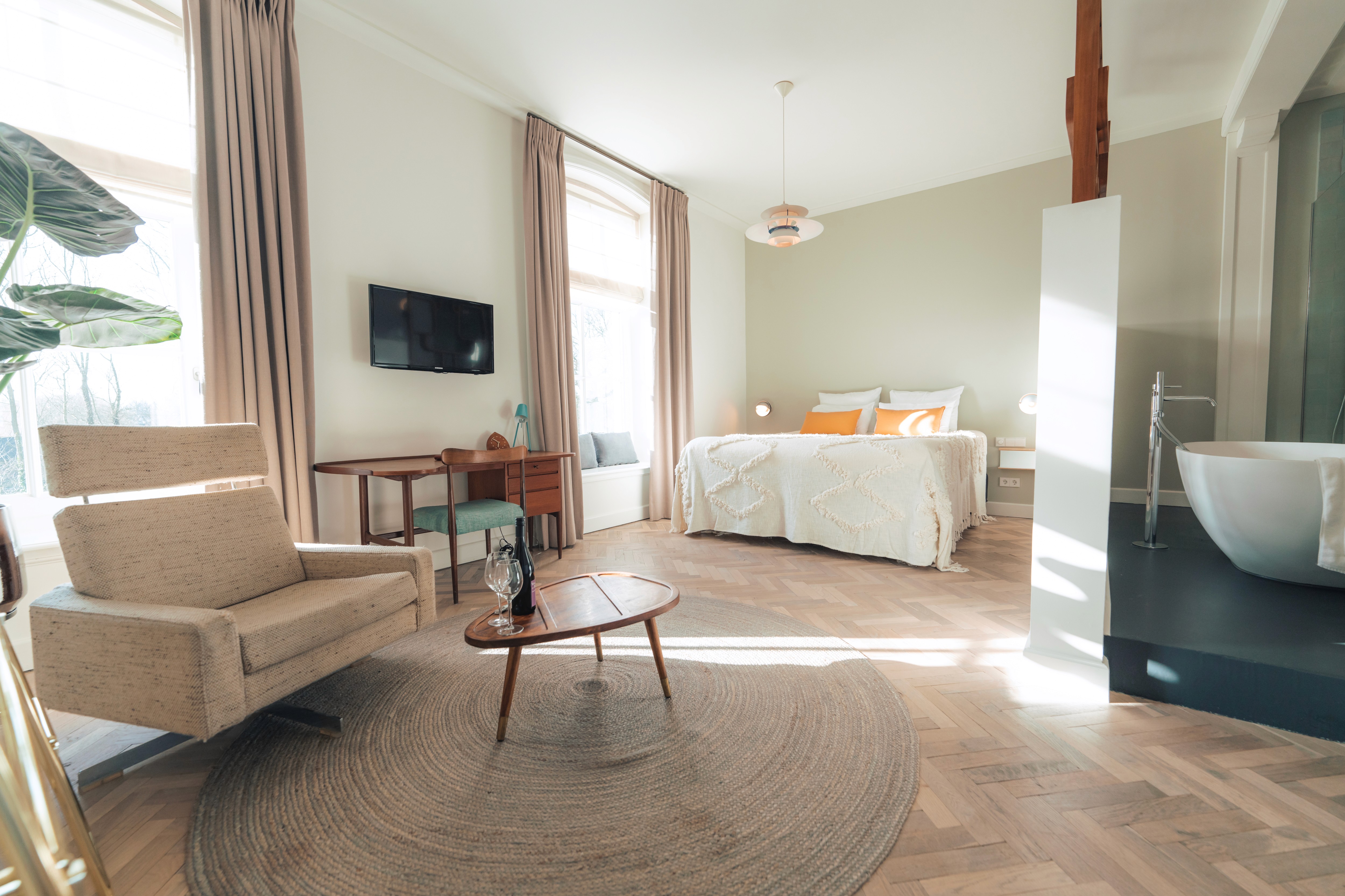 lake landscape with clear blue water, forest and mountains at the backdrop