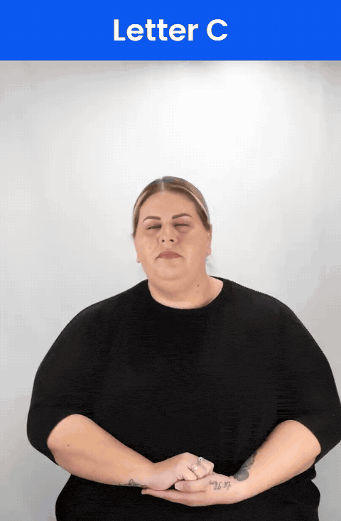 Animated GIF: a Deaf signer signs C in ASL, fingers and thumb curved into the shape of a C.