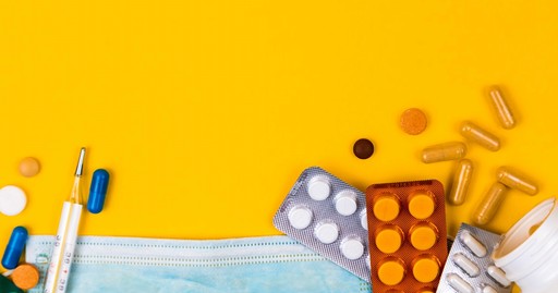 Pills on a solid color background