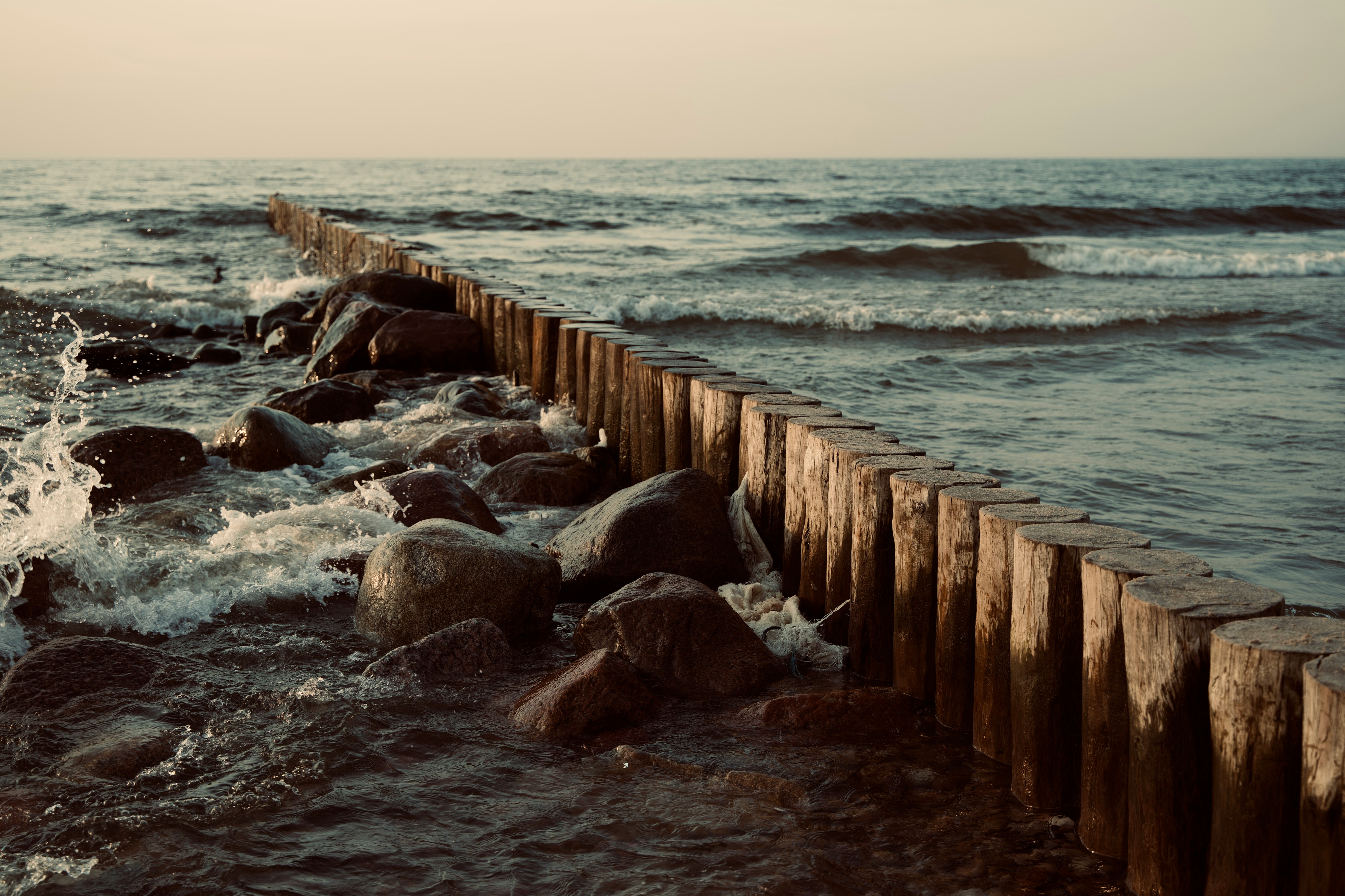 brown wooden dock on sea during daytime