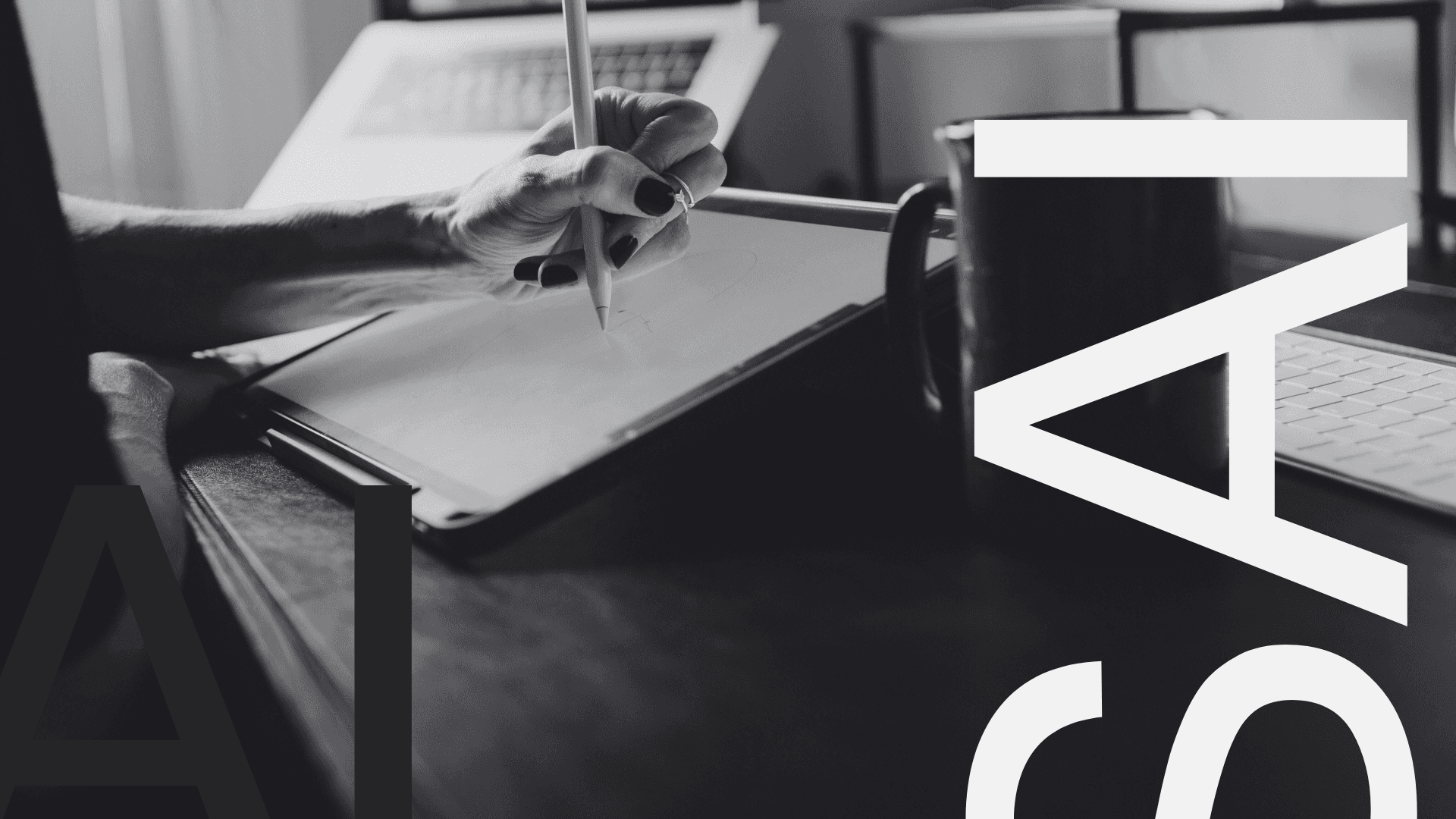 A Team of 4 people looking at the screen of a computer