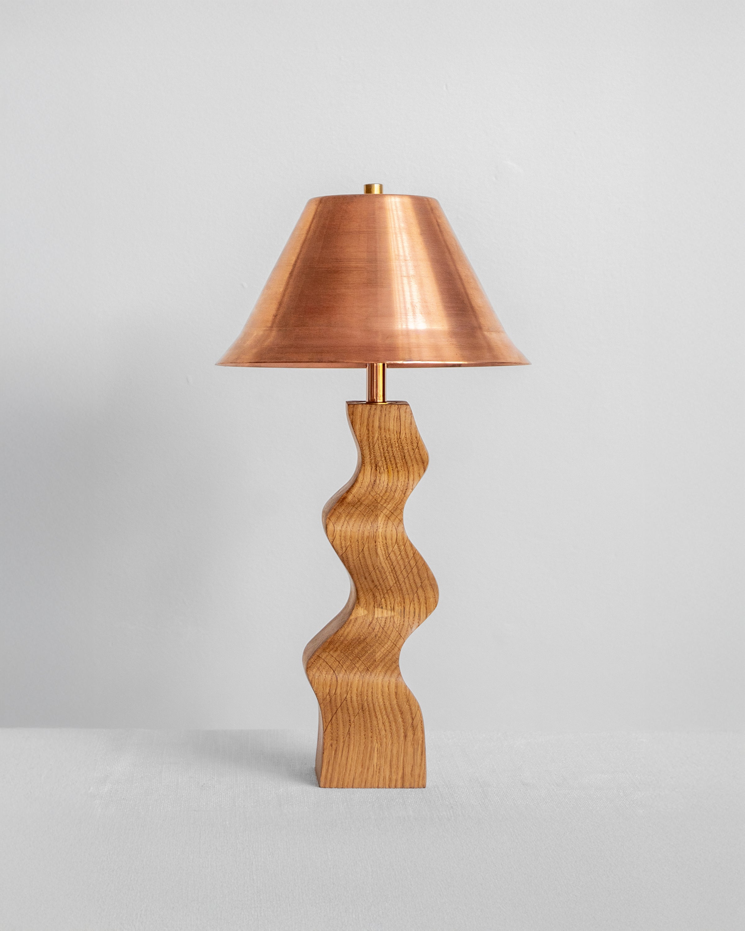 Rippled Desk Lamp in Oak with Copper Shade with UK, EU and US/CA wiring available on white background Wilkinson & Rivera