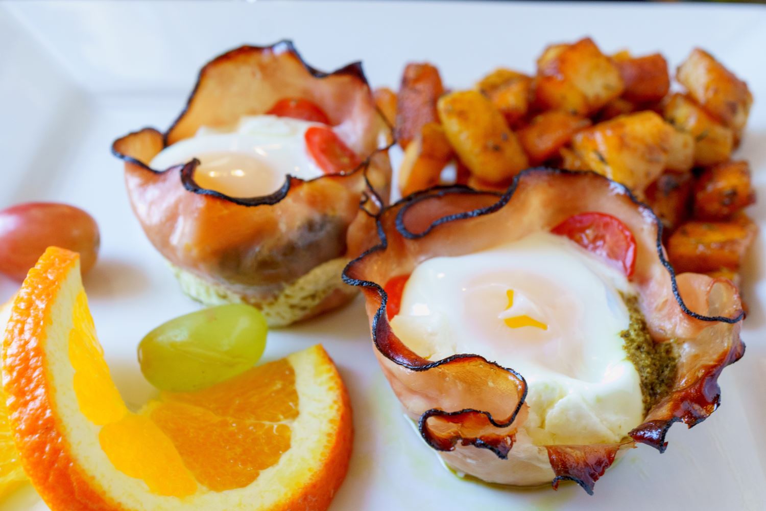 nfinity pool blending into the ocean view, minimalist sun loungers in soft neutral fabric, curved architecture