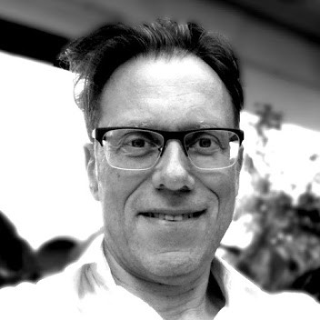 Golden Bowl on Wooden Platform