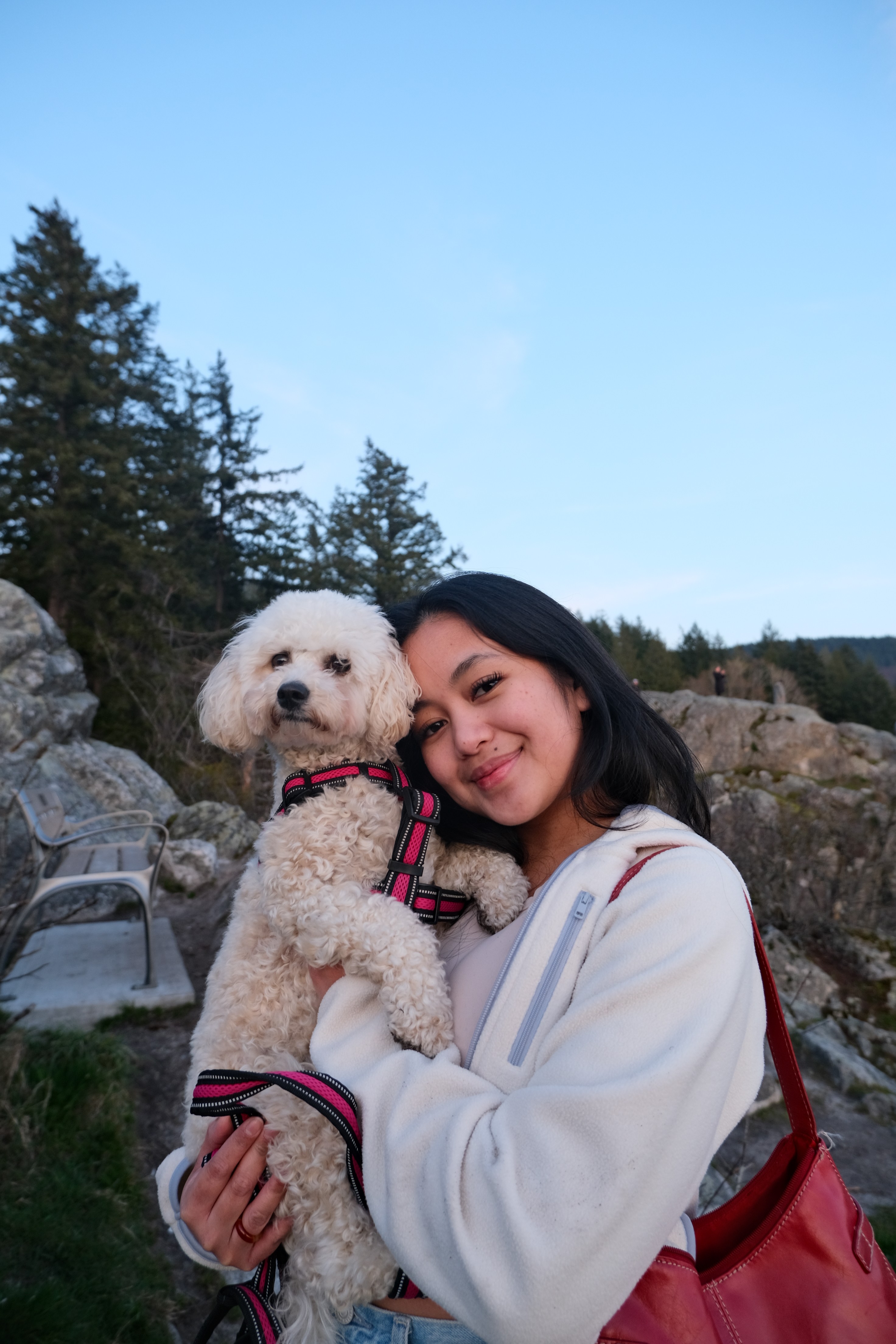 a group of people walking on a sidewalk