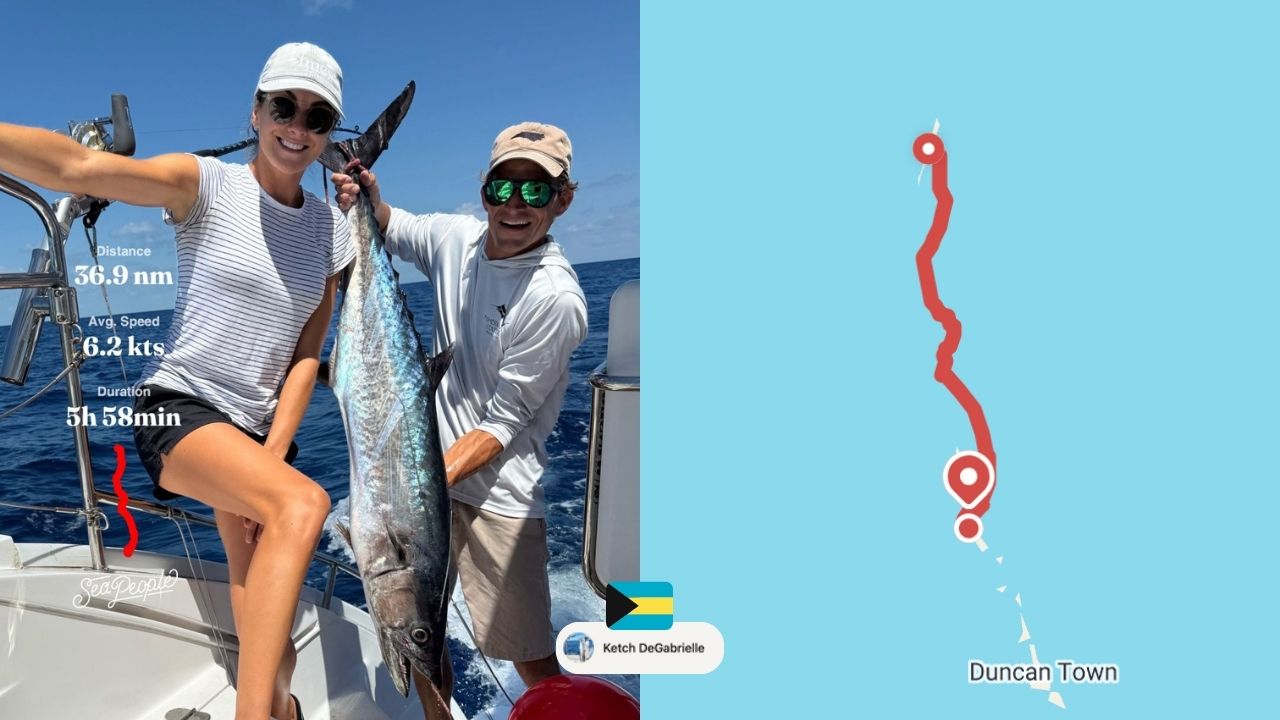 Two people catching a fish in Duncan Town Bahamas