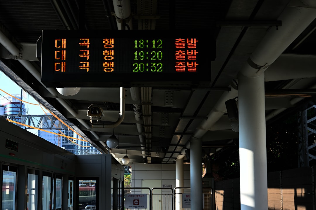 Digital display board with train schedule and times