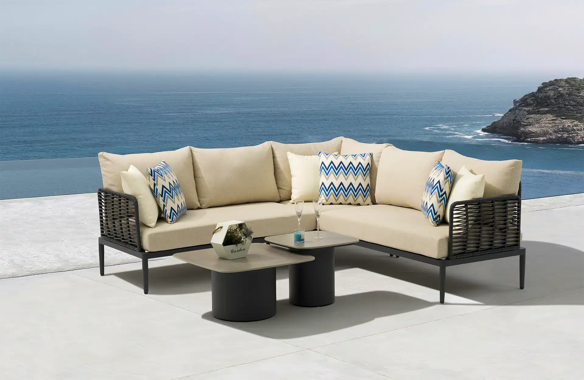 Outdoor garden furniture set from Bali COCO in a lush garden setting.