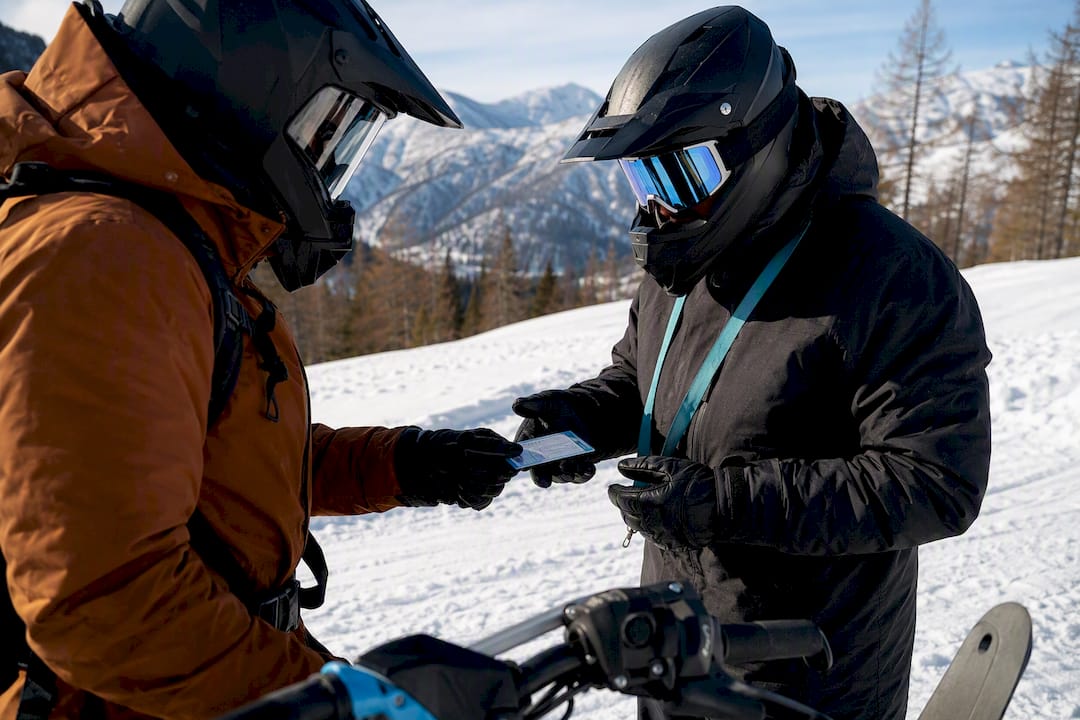 Snowmobiler preparing for a guided ride in Ridder