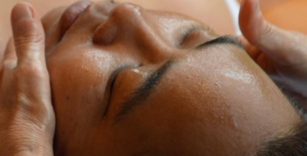a dropping bottle with bird of paradise flower