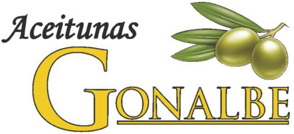 a young man wearing glasses standing in front of a mountain