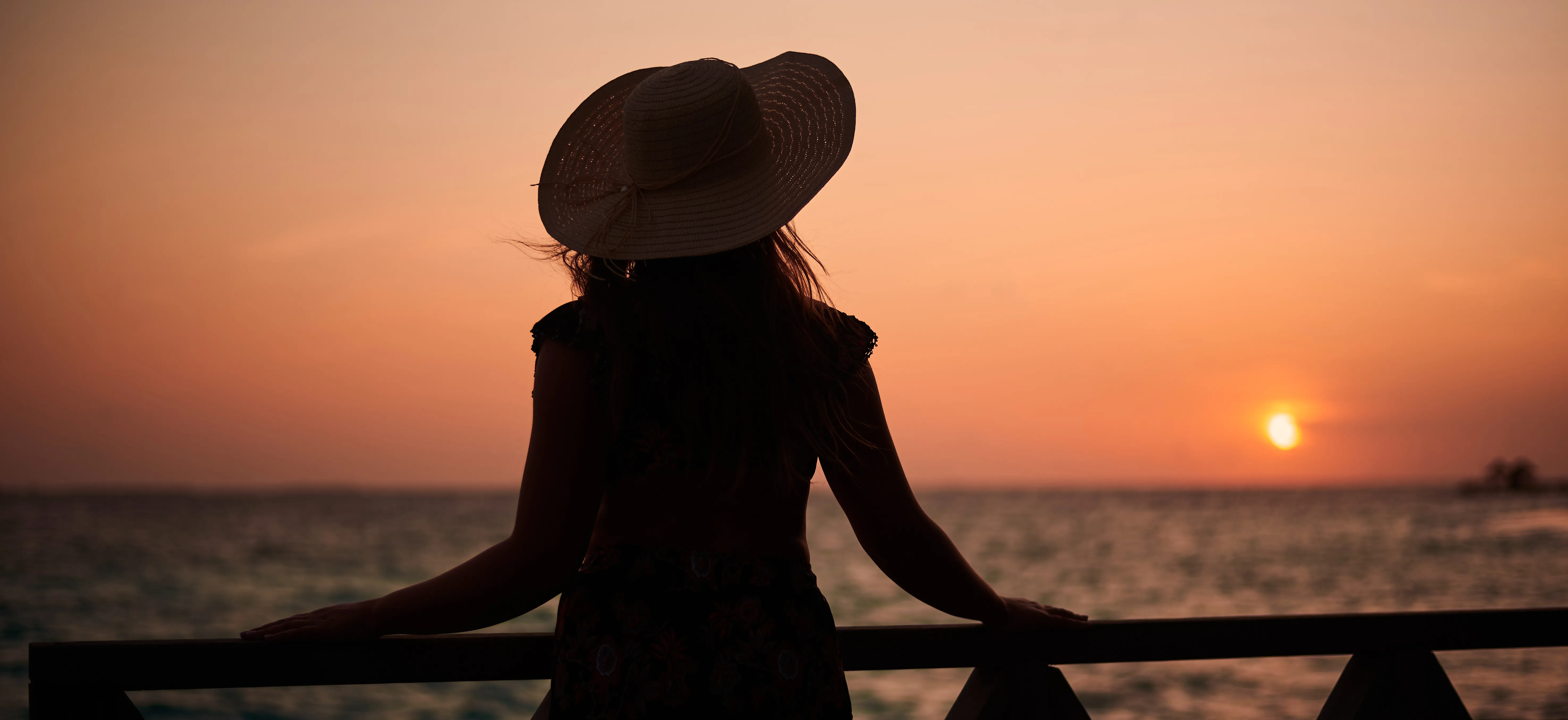an aerial view of a desert with rocks and sand