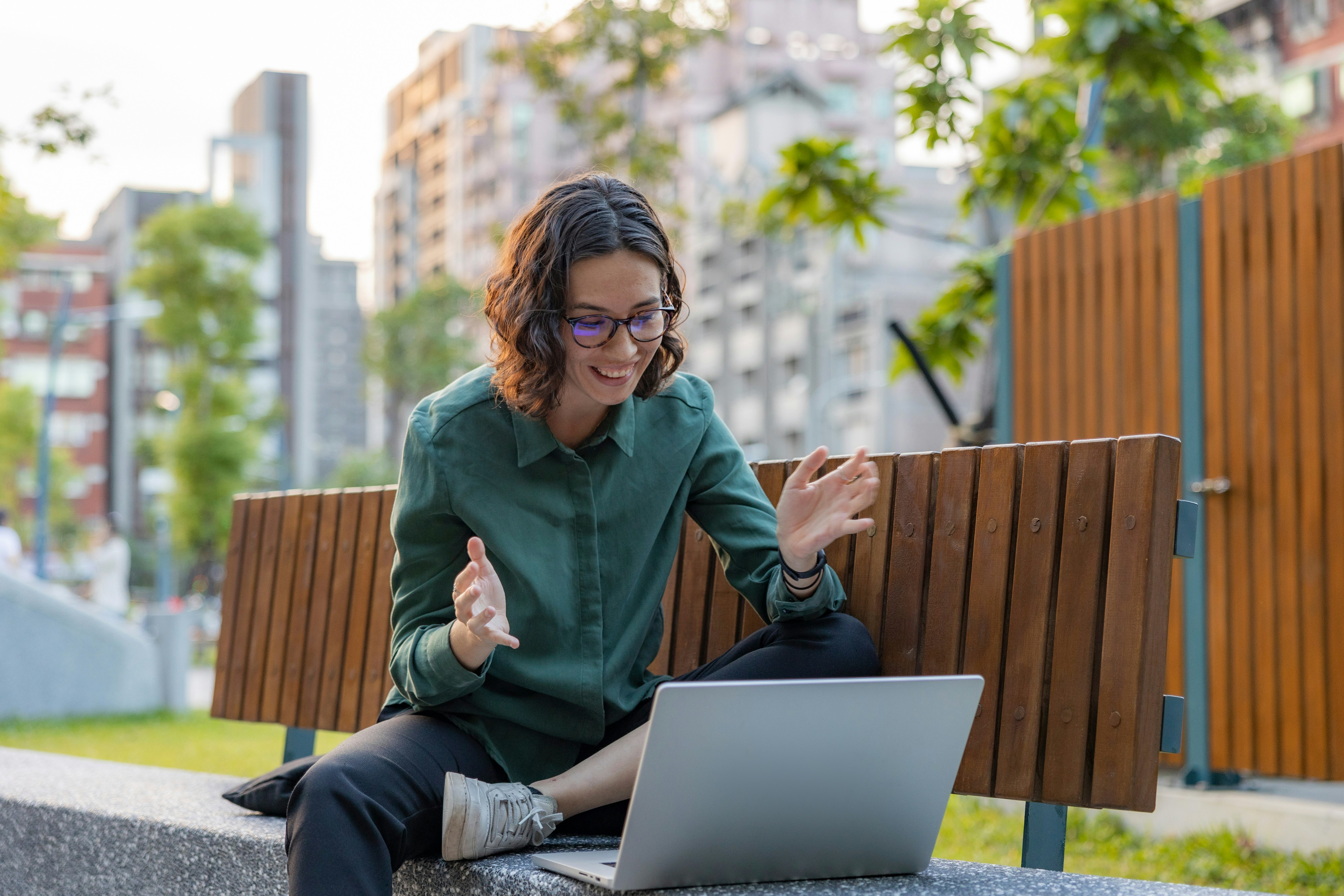 person sitting on a bench - Marketing Automation Guide