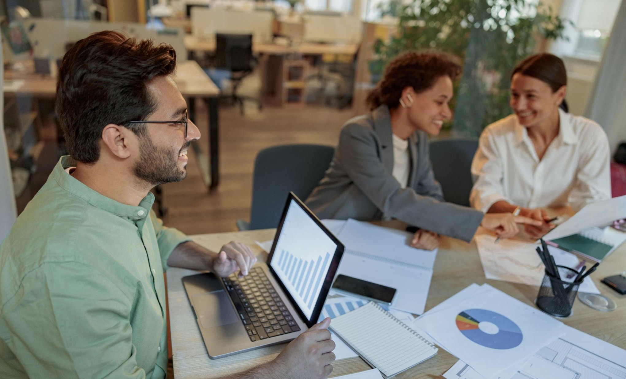 Sales team collaborating on lead generation campaign