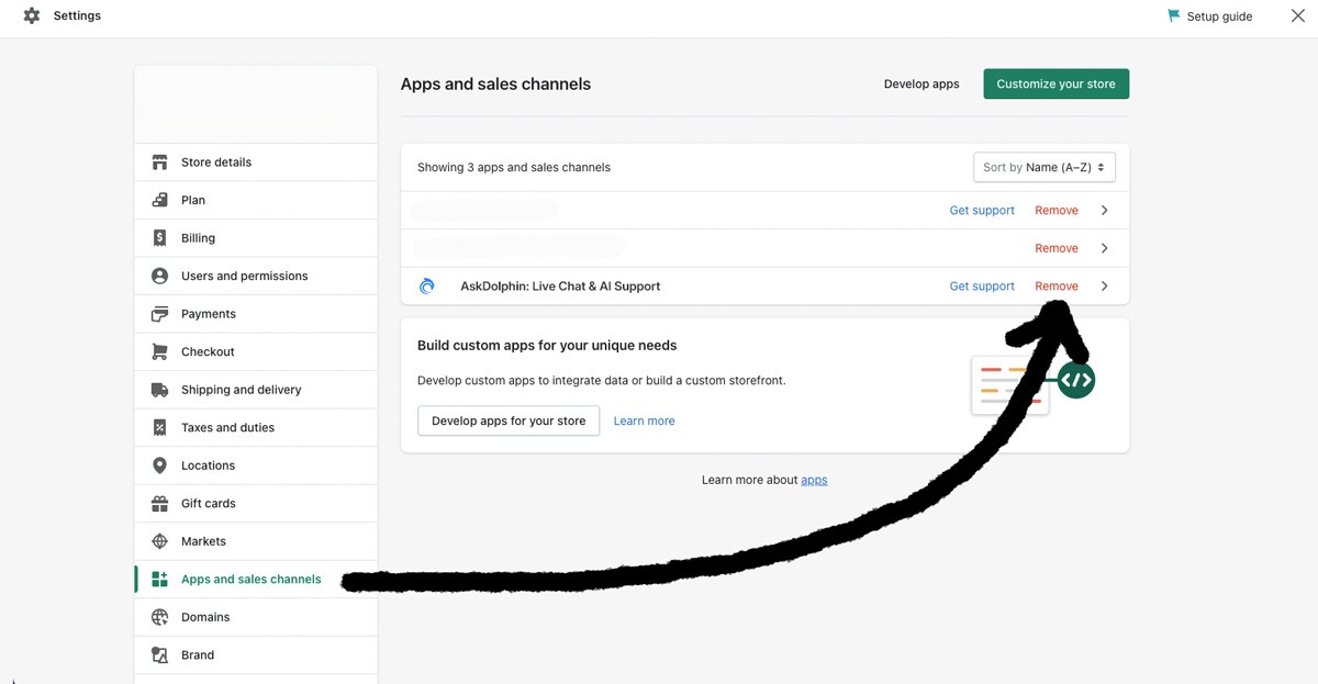 Shopify Apps and sales channels page with an arrow highlighting the AskDolphin: Live Chat & AI Support app entry and remove button.