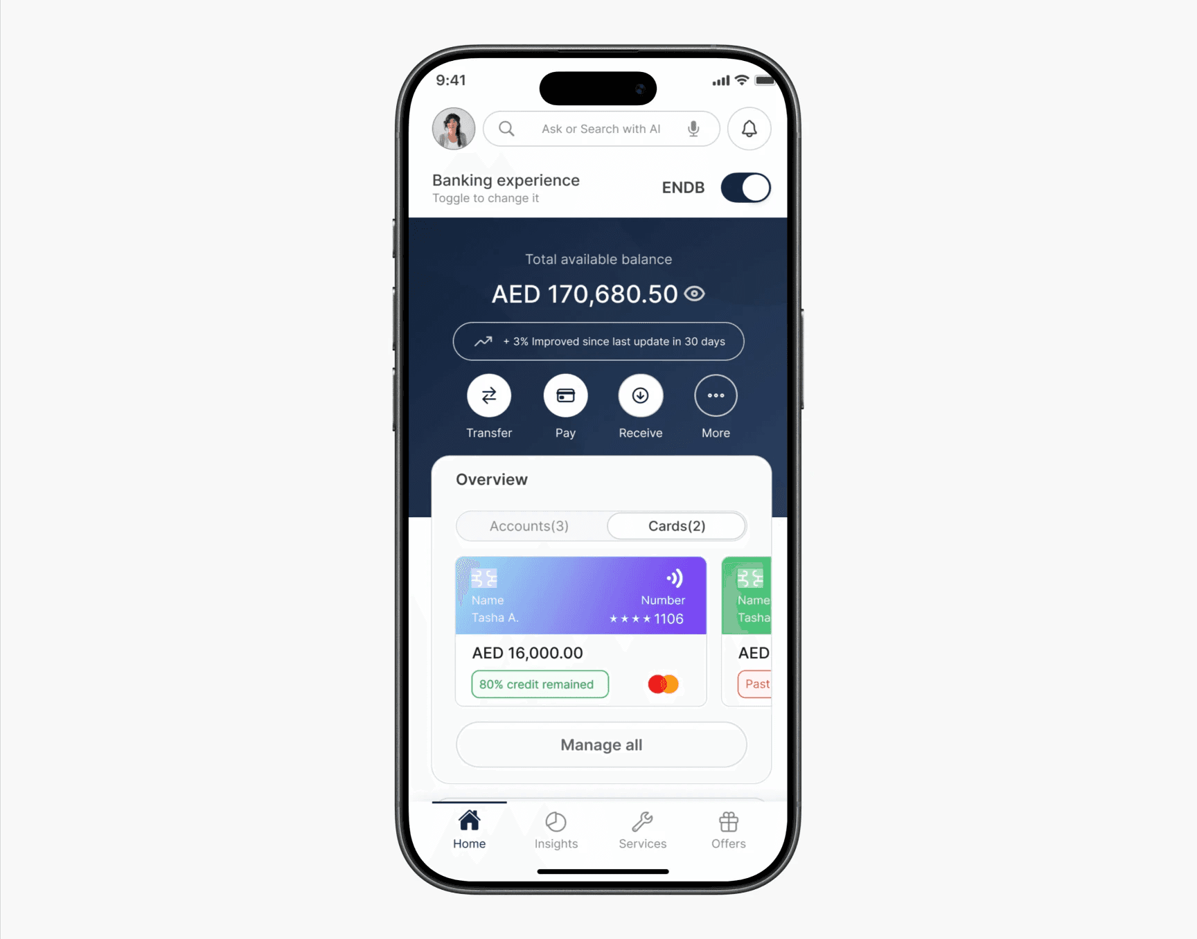 Hand flipping through a book on table beside a cup.