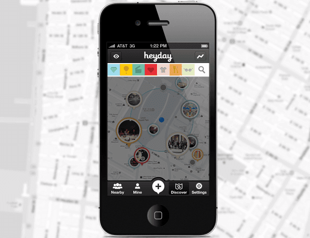 A black iPhone displays a map application interface. The screen shows a central map with circular markers and surrounding streets. Below the map are four tabs: "Nearby," "Mine," "+," and "Discover." At the top, the time is 1:22 PM, and the carrier is AT&T 3G. The map background is overlaid with a faint, light-colored map pattern.