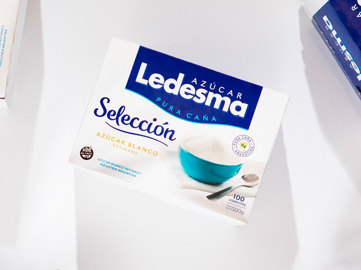 Rustic cabin in a golden field at sunset