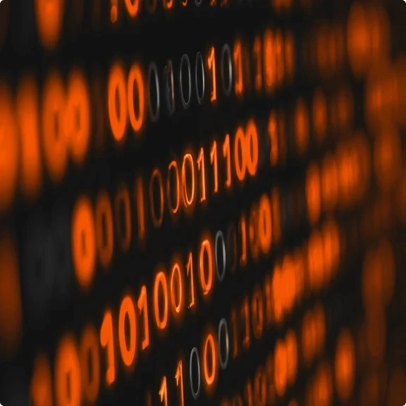 Binary code displayed on a dark background with orange and gray numbers.