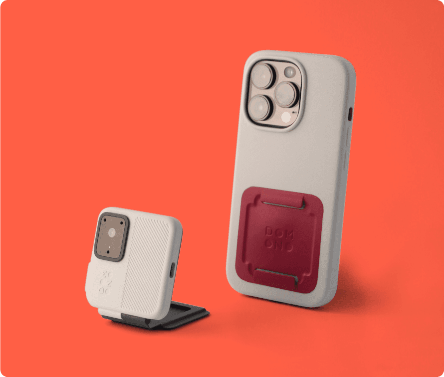 Portable action camera next to a compatible phone case, designed for easy attachment and integration, ready for use with smartphones.