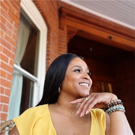 friendly female pediatrician touches shoulder teenage