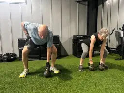 man in black hoodie standing