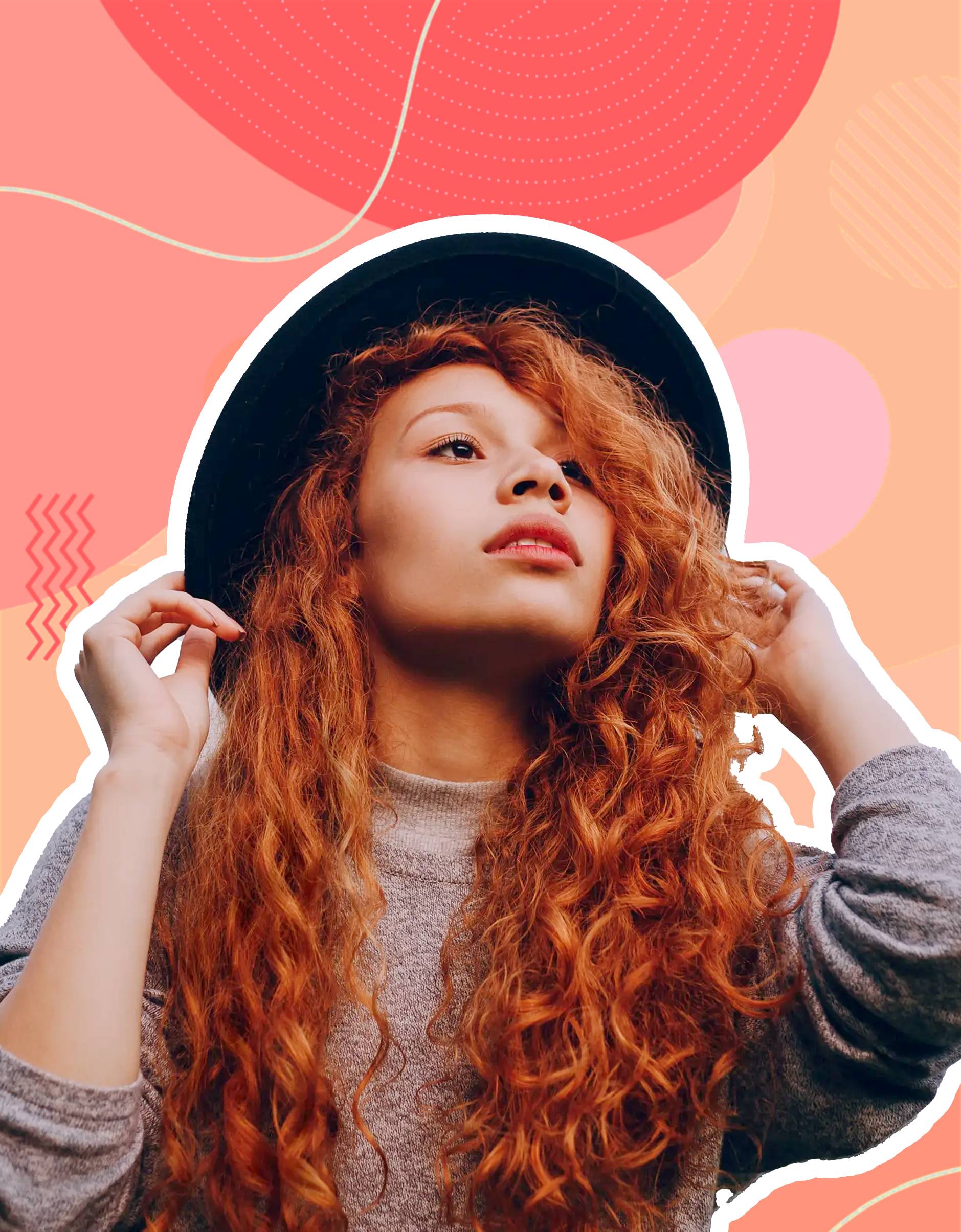 A woman with long, curly red hair wearing a black hat, gazing thoughtfully into the distance.